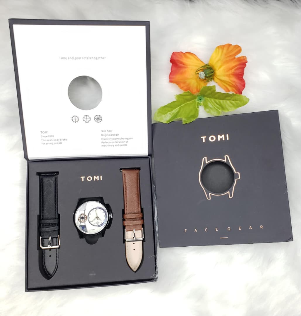 T105 Constellation watch in a gift box with black and brown interchangeable straps